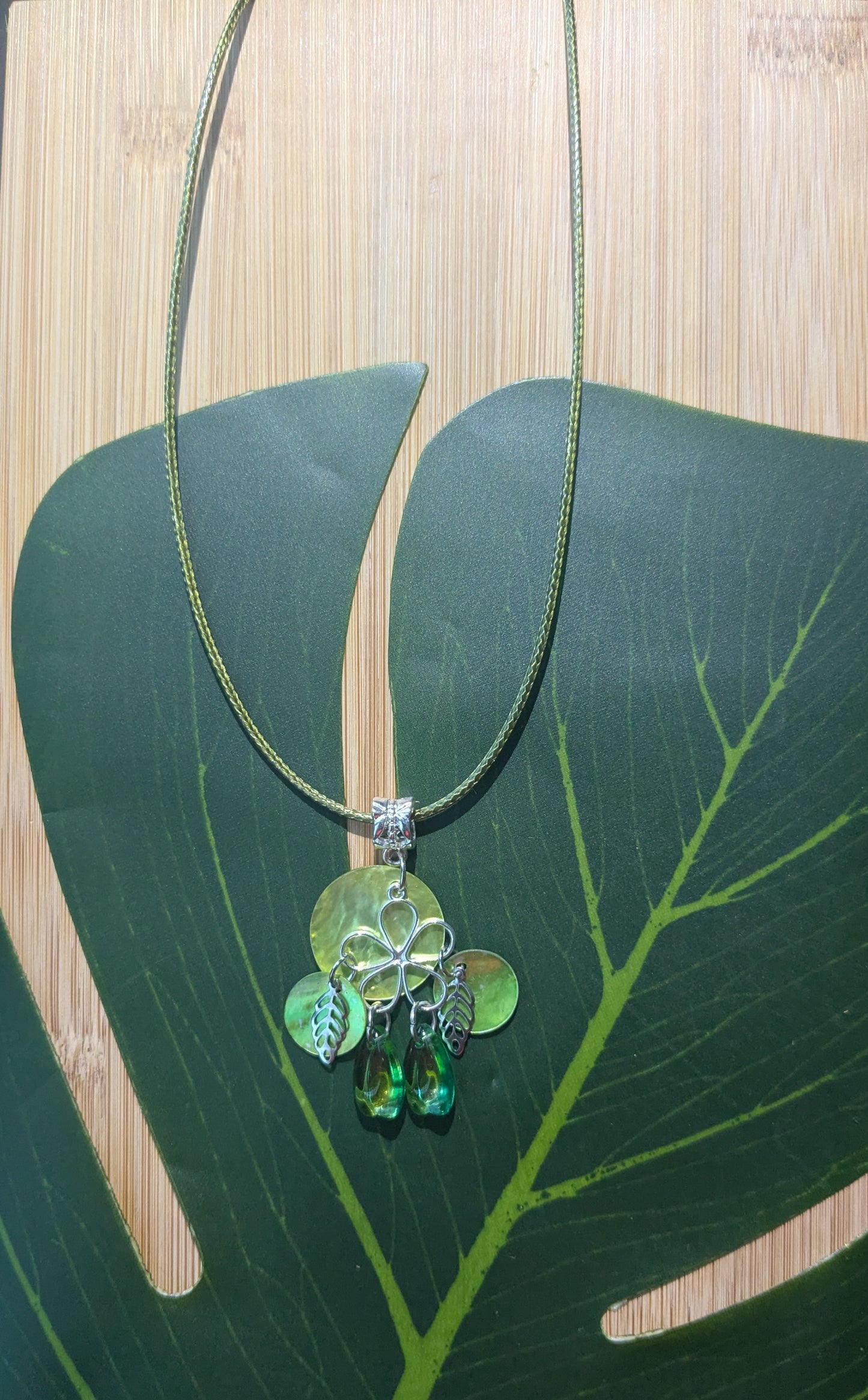 Leather necklace with shell and pendant