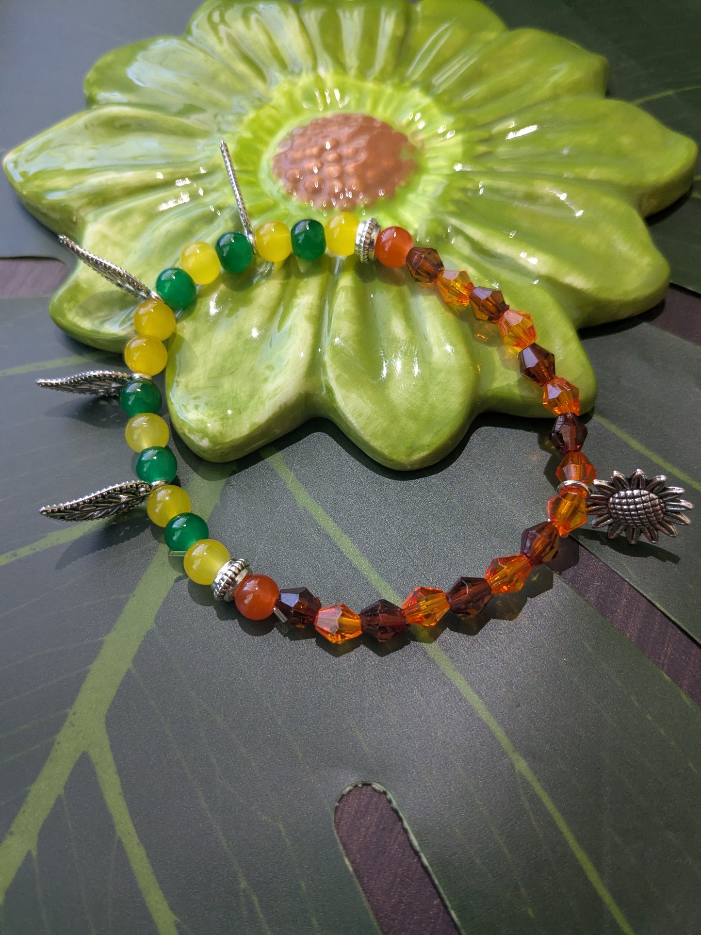 Beaded bracelet with charms