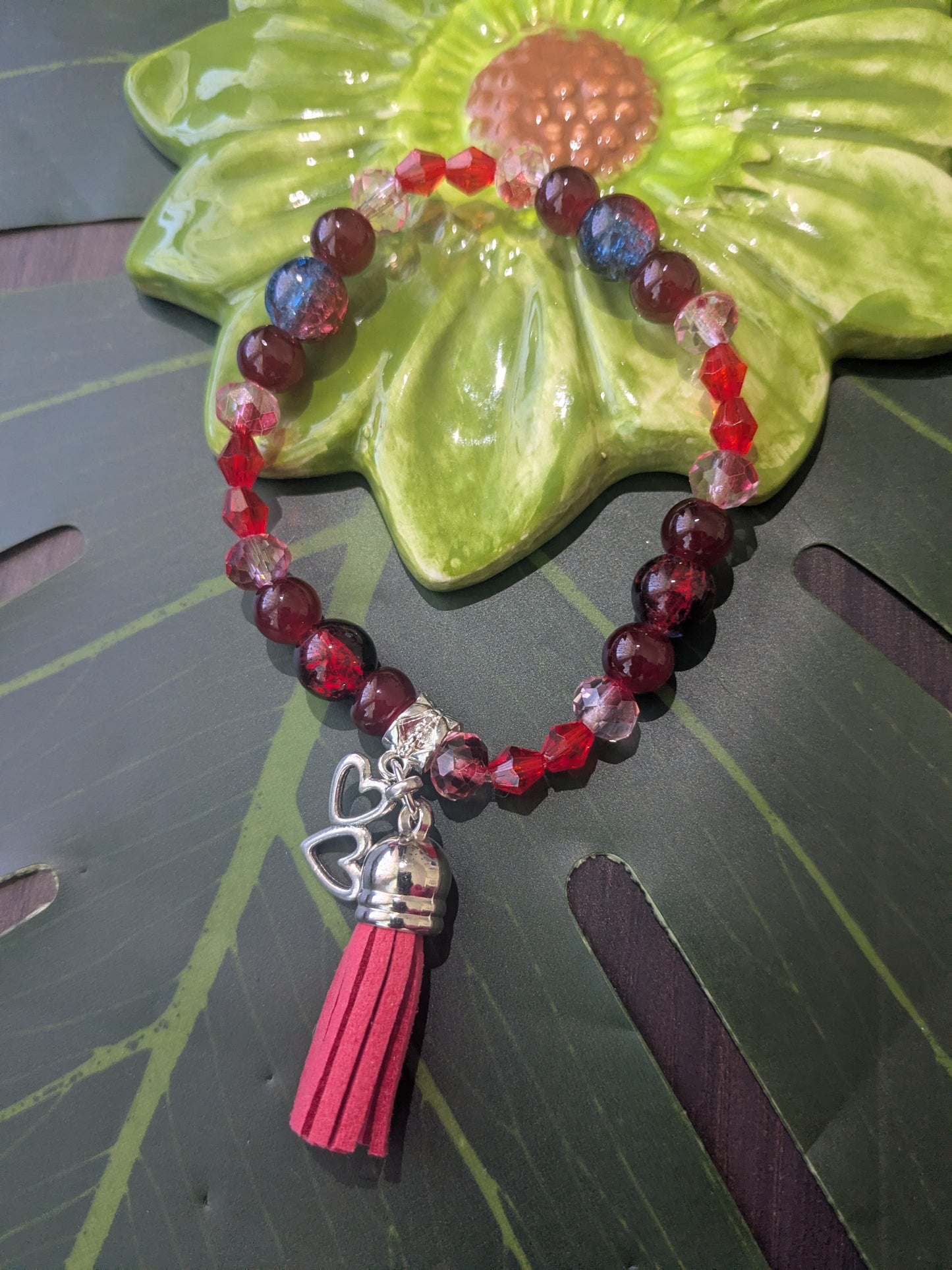 Beaded bracelet with charms