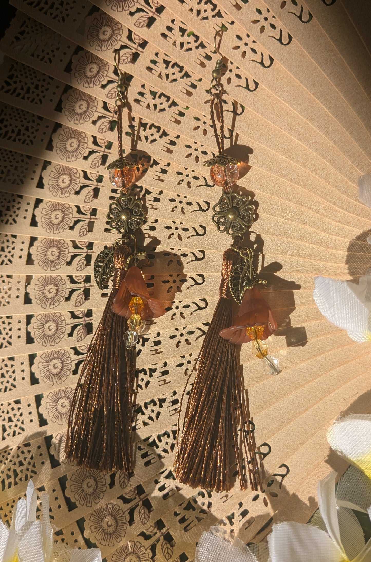 Earring with tassel, flower and beads