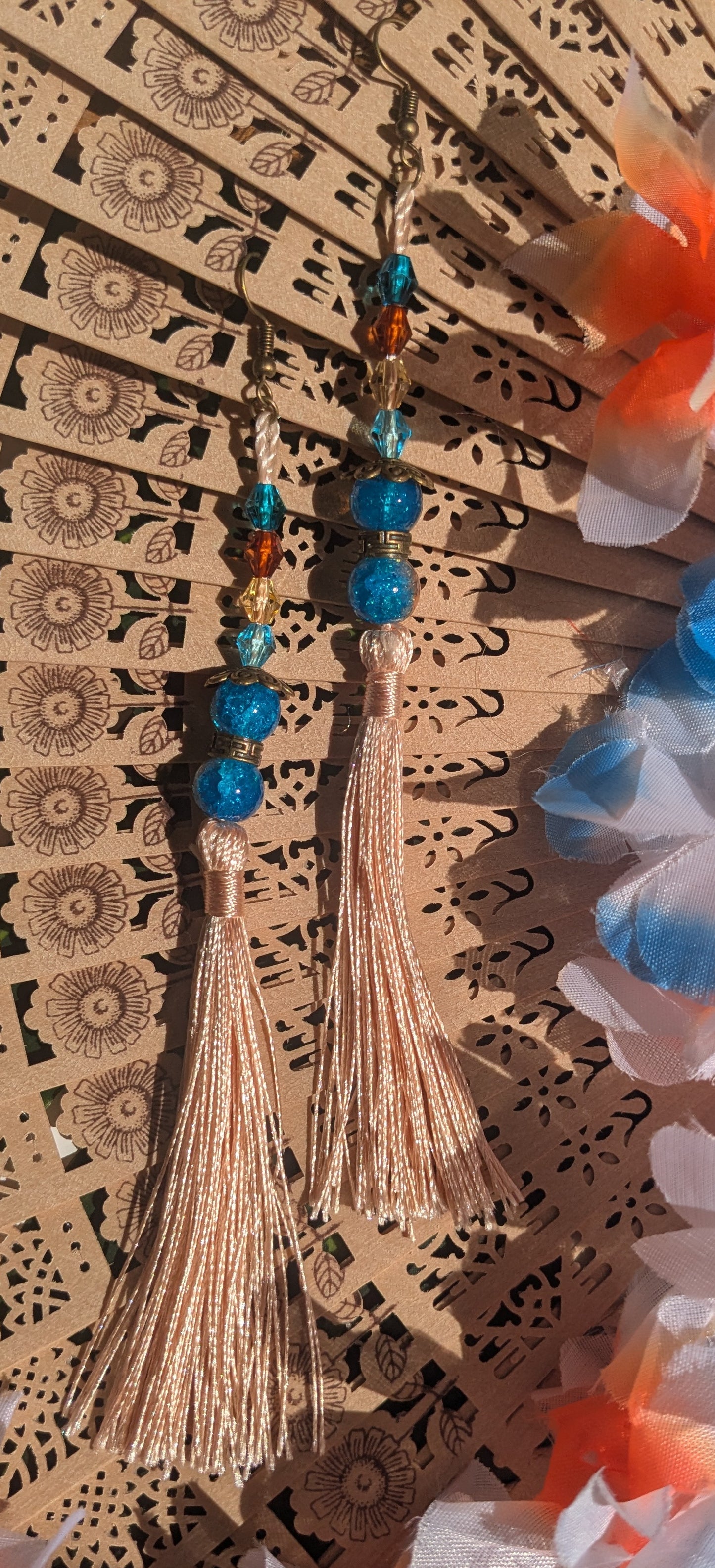 Earring with tassel and beads