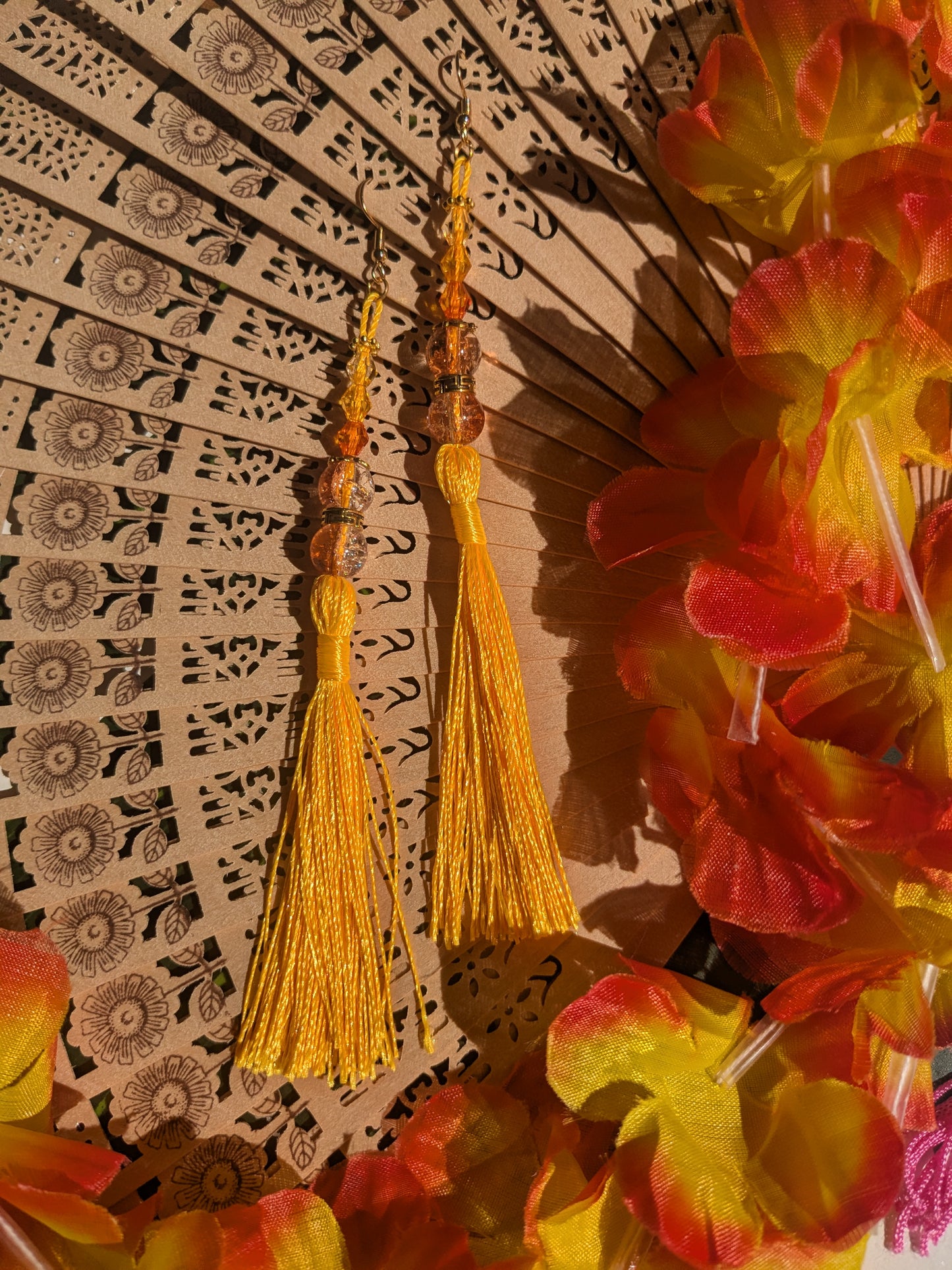 Earring with tassel and beads