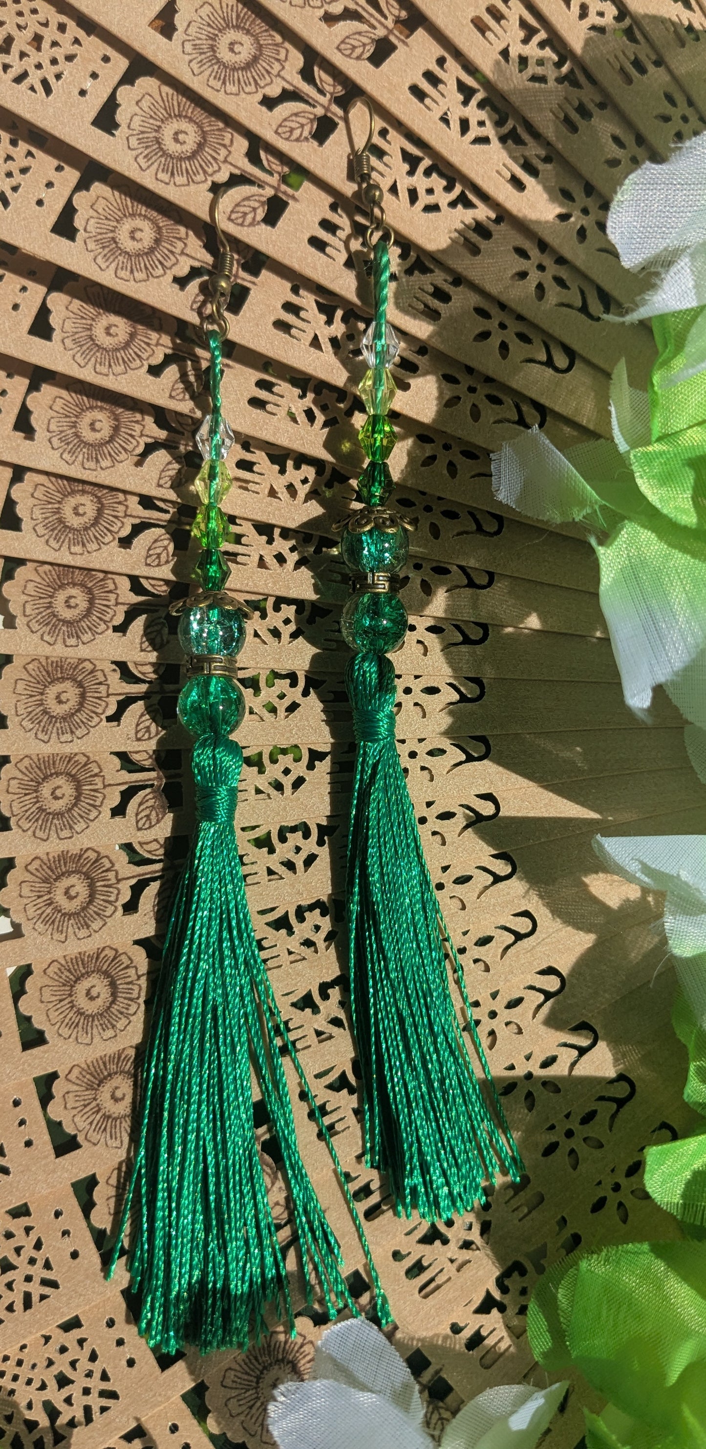 Earring with tassel and beads