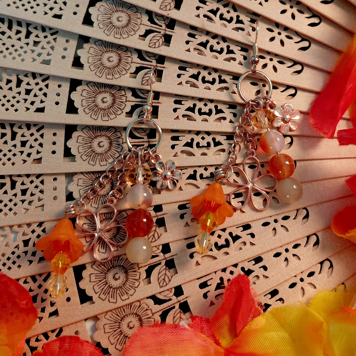 Earring with gem stones, beads and charms