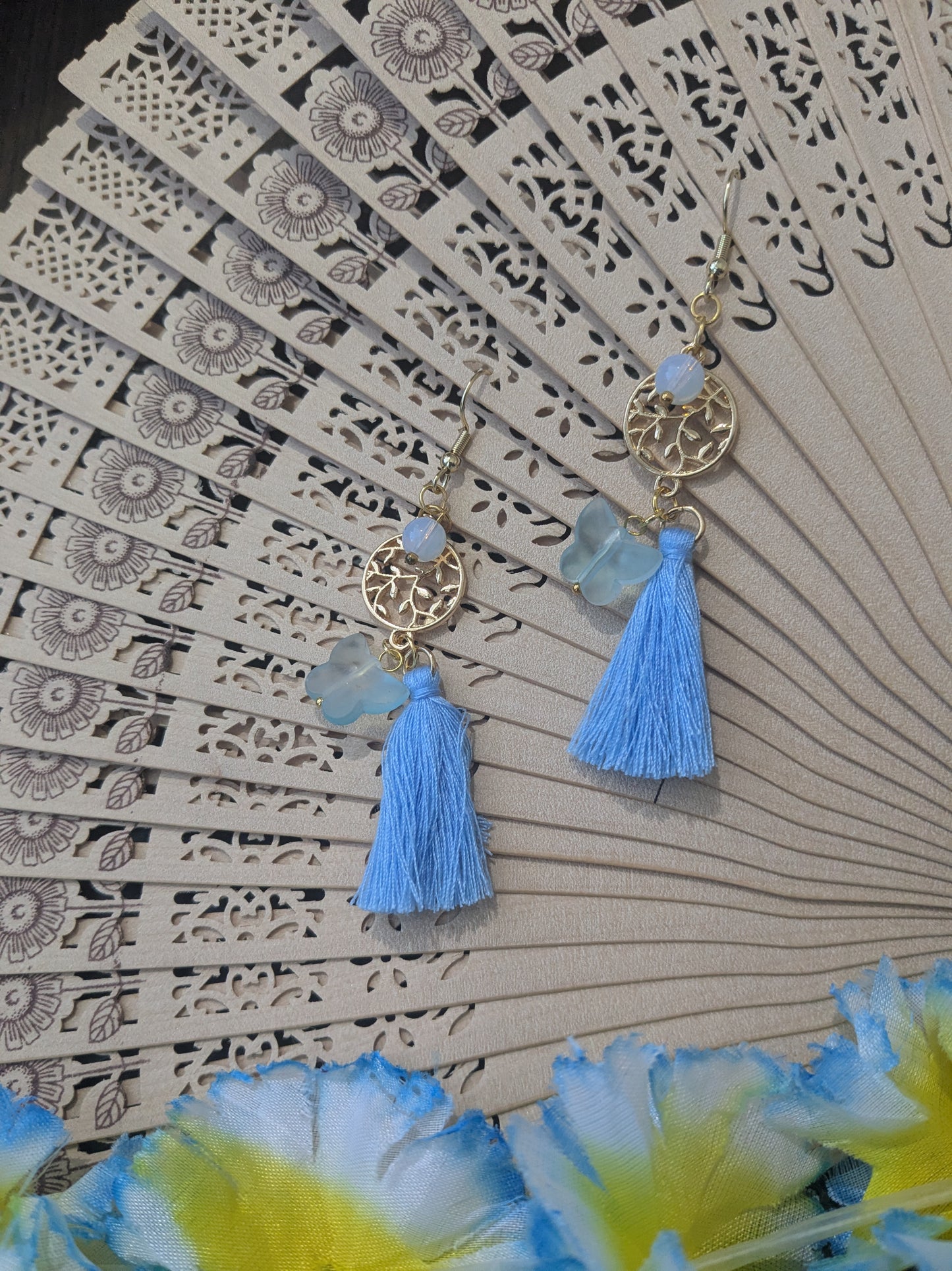 Earring with bead, pendant and tassel