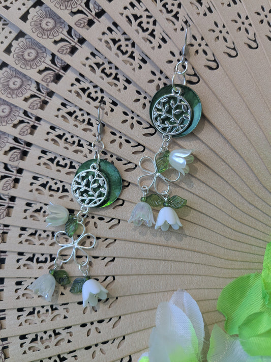 Earring with shell and pendants