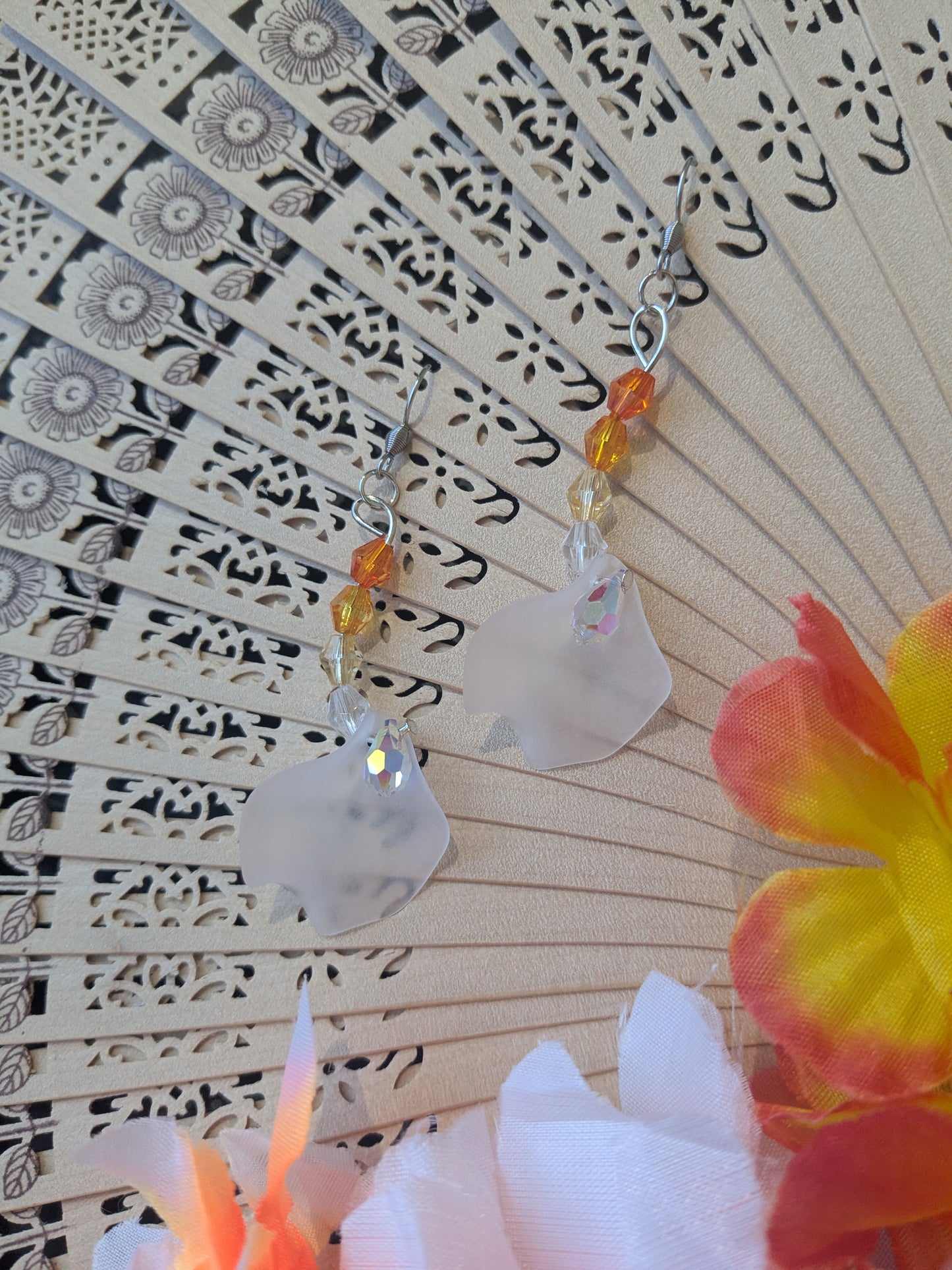 Earring with beads and flower petal