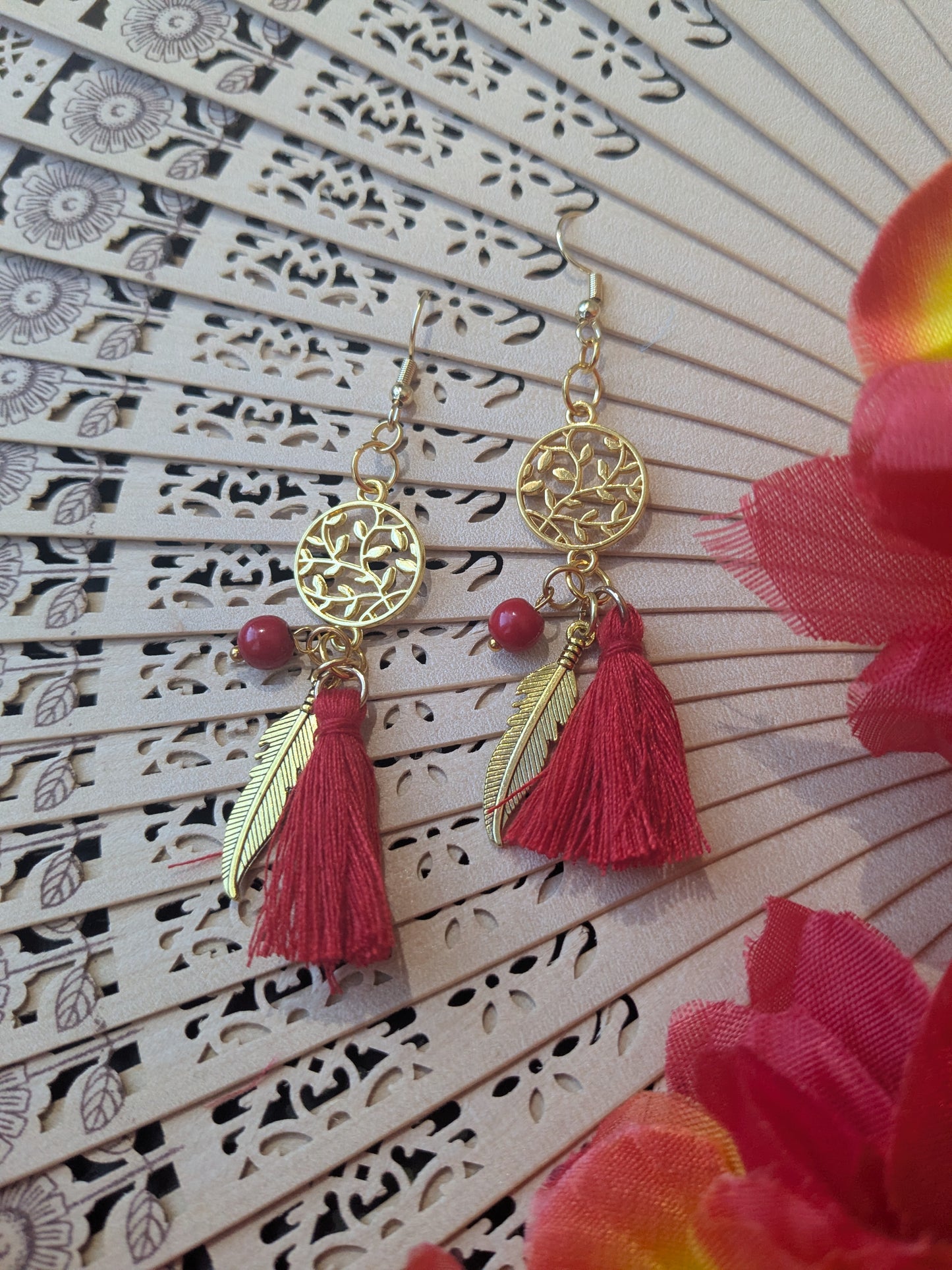 Earring with tassel and pendant