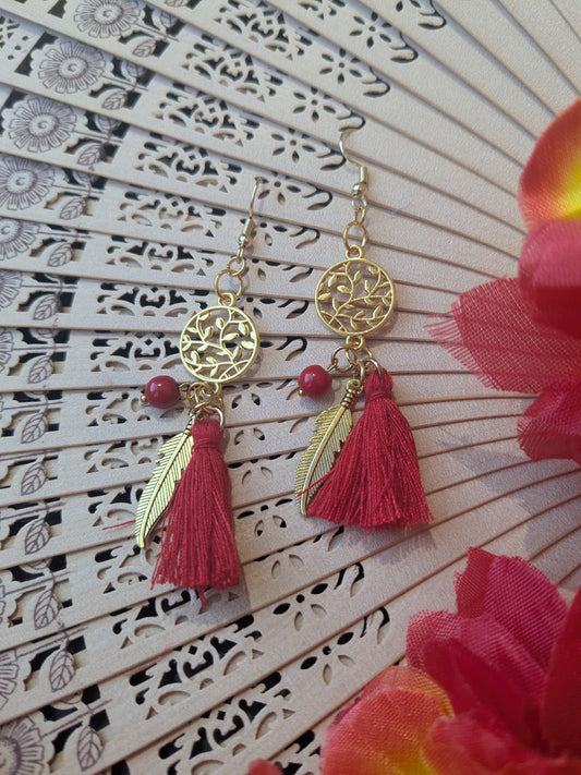 Earring with tassel and pendant