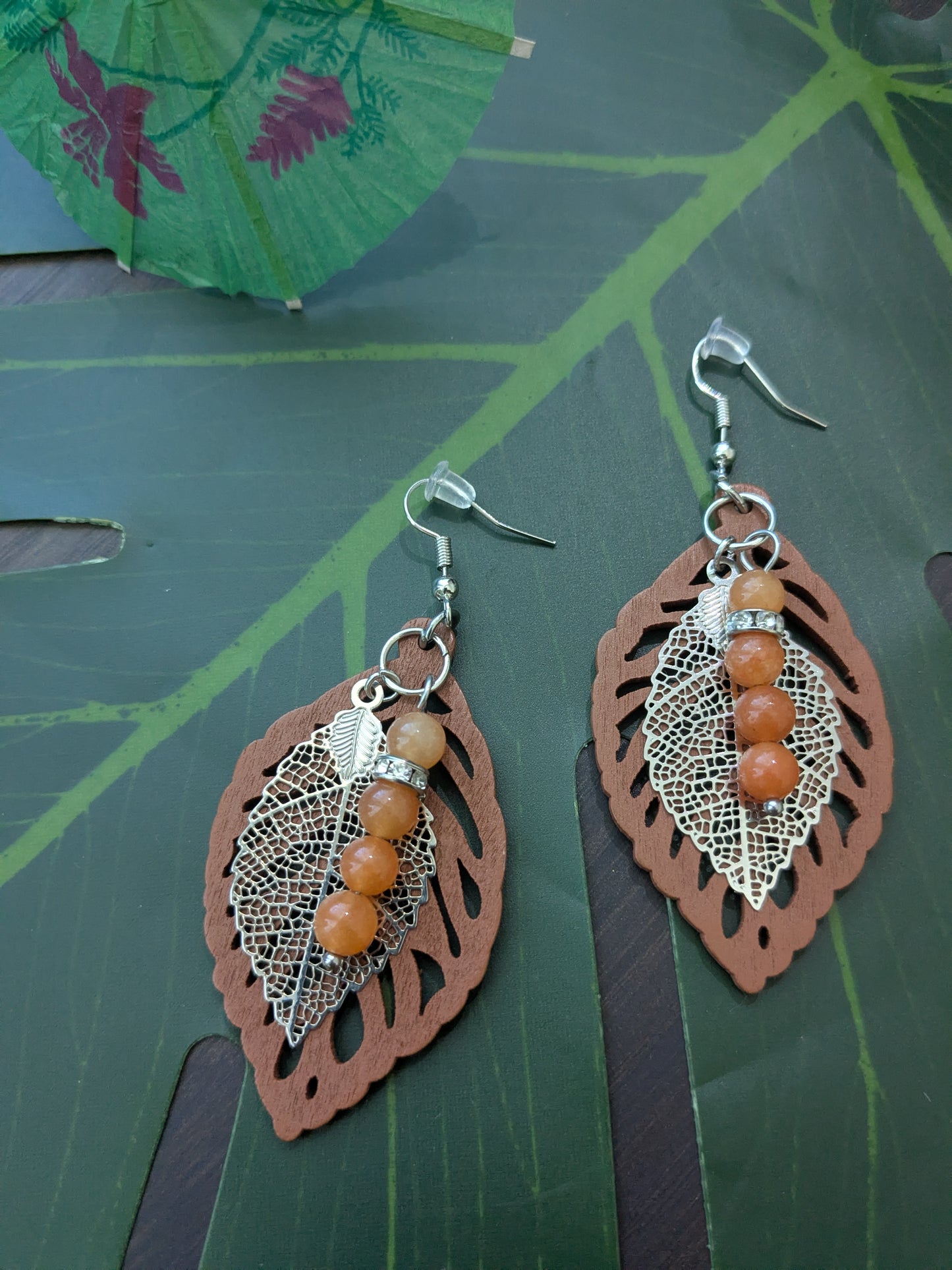 Earring with beads and pendant