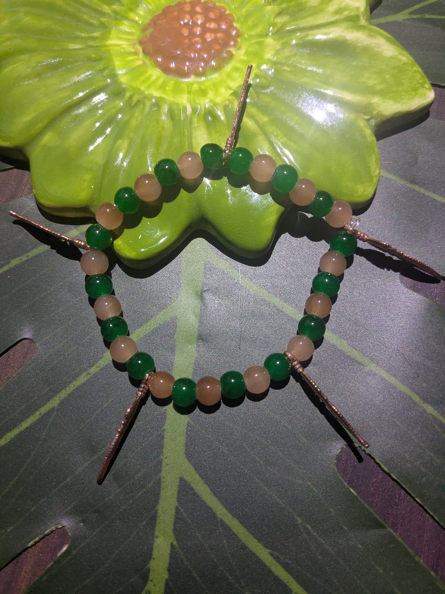Beaded bracelet with charms