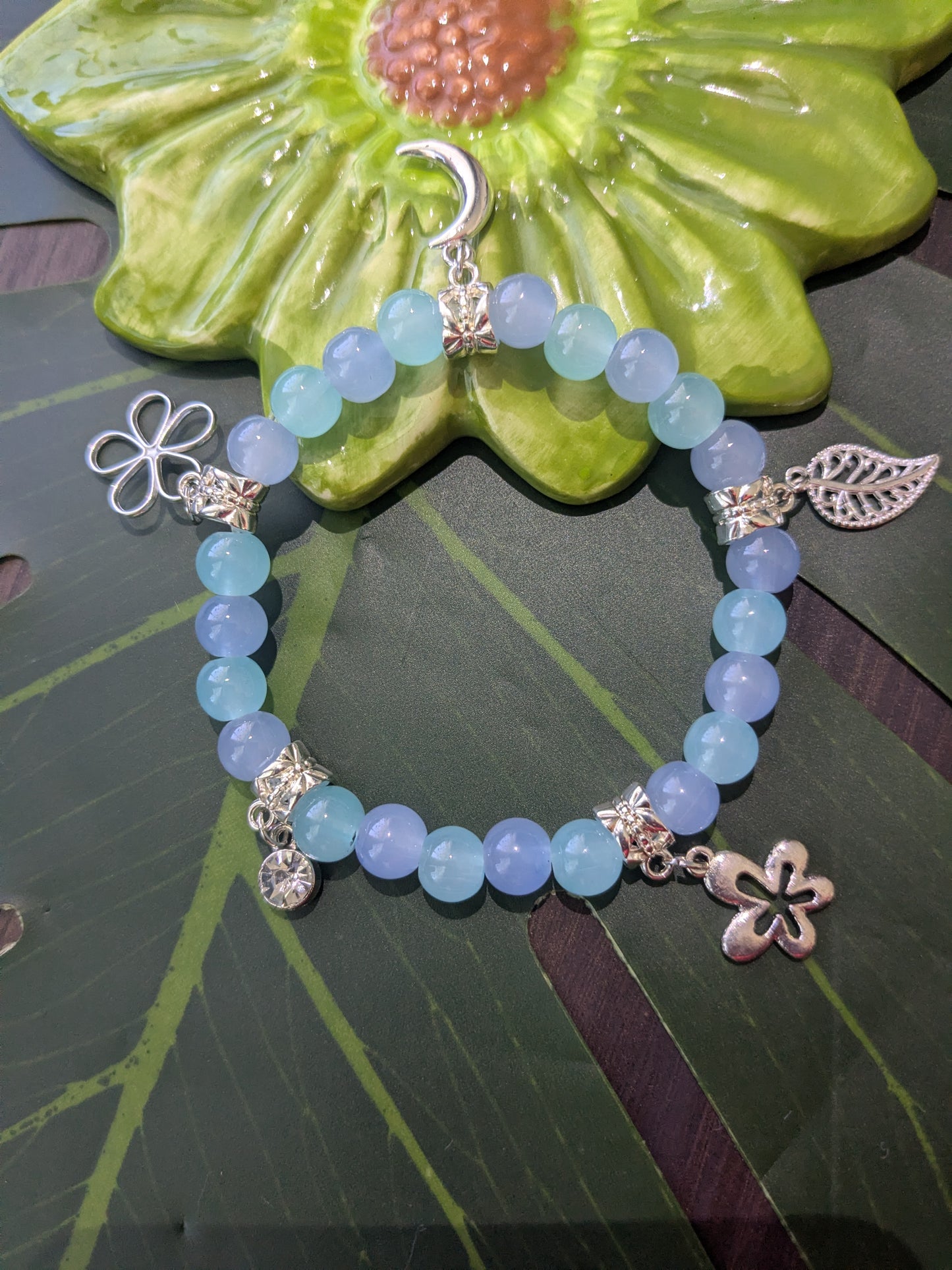 Beaded bracelet with charms