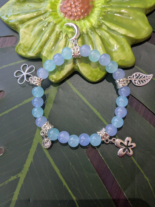 Beaded bracelet with charms