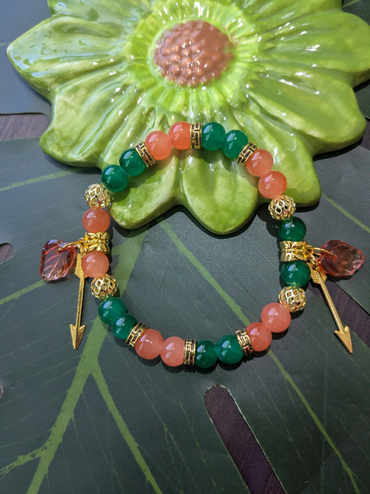 Beaded bracelet with charms