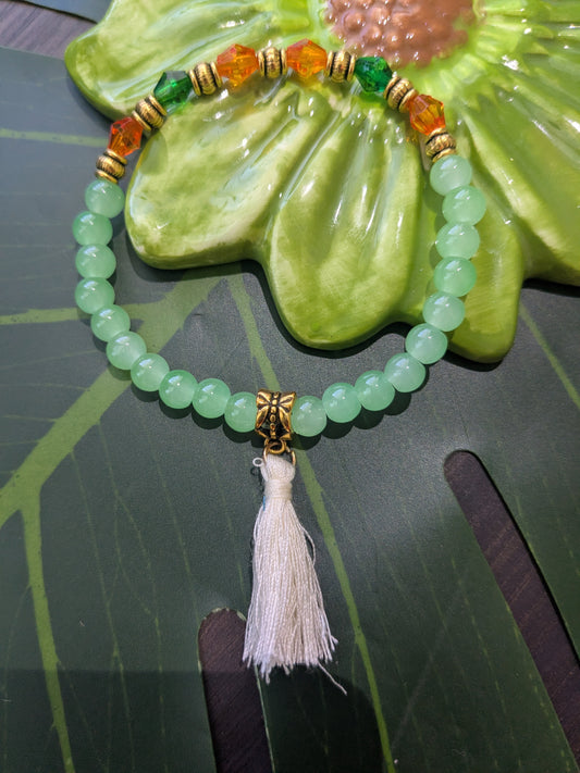 Beaded bracelet with tassel