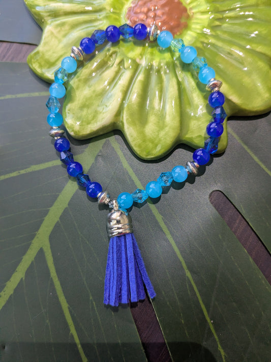 Beaded bracelet with tassel