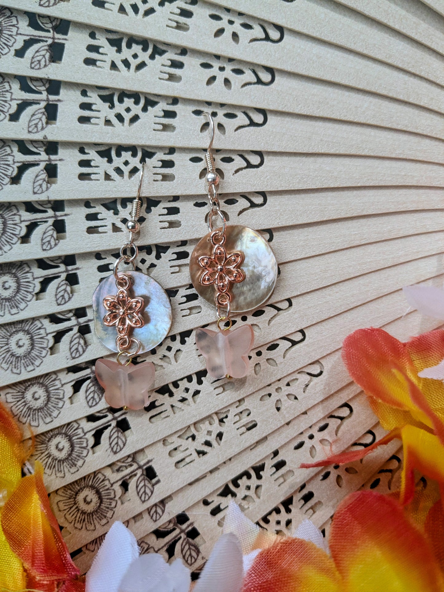 Earring with shell and pendant