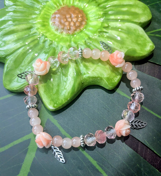 Beaded bracelet with charms