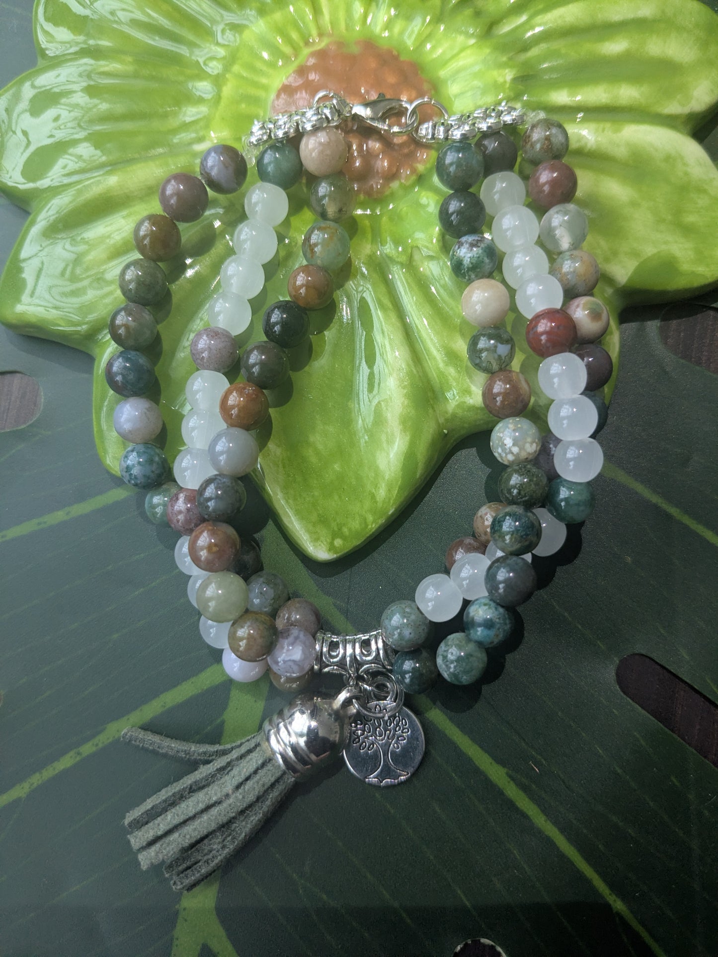 3 layered beaded bracelet with tassel and charm