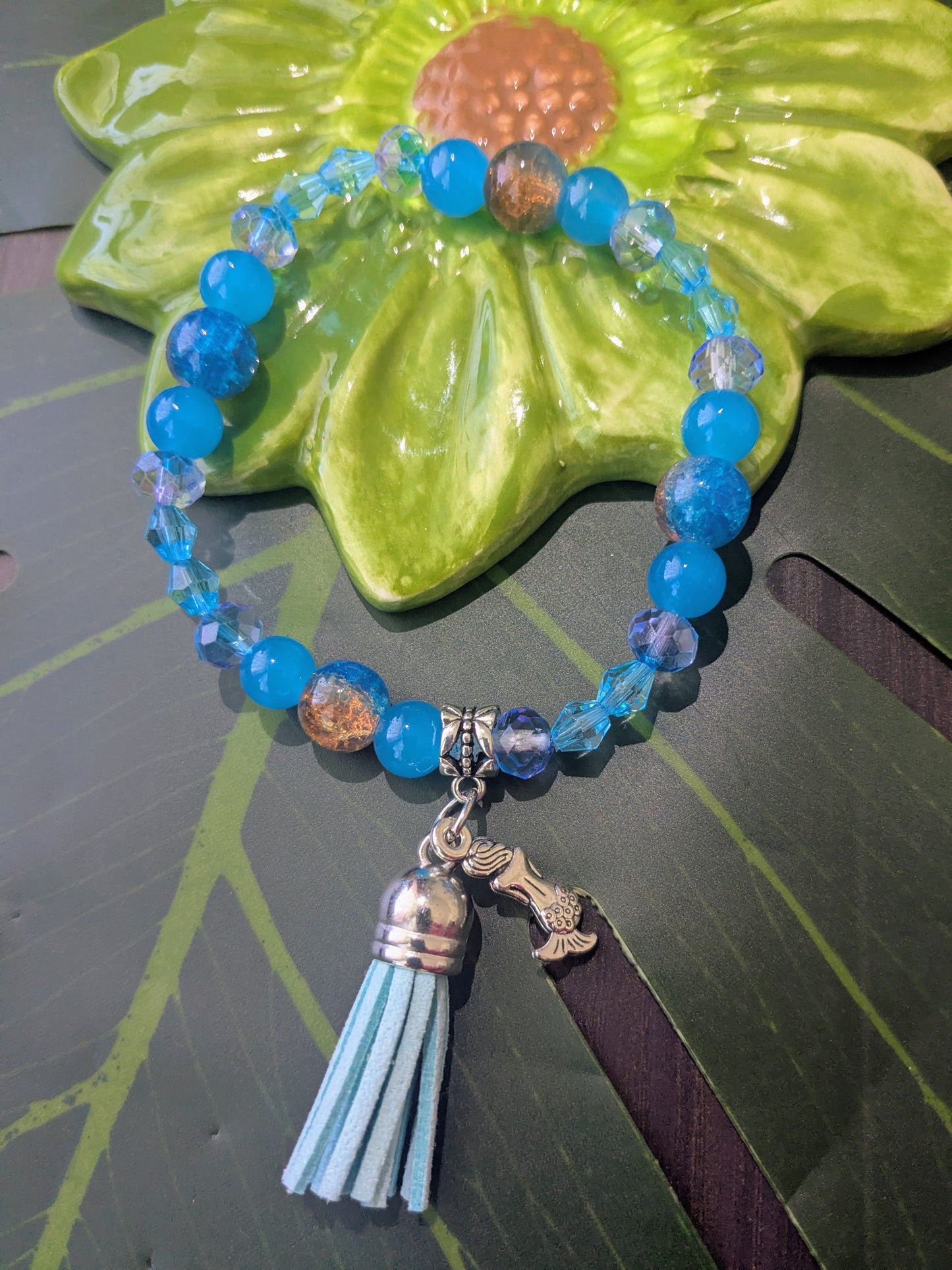 Beaded bracelet with charms