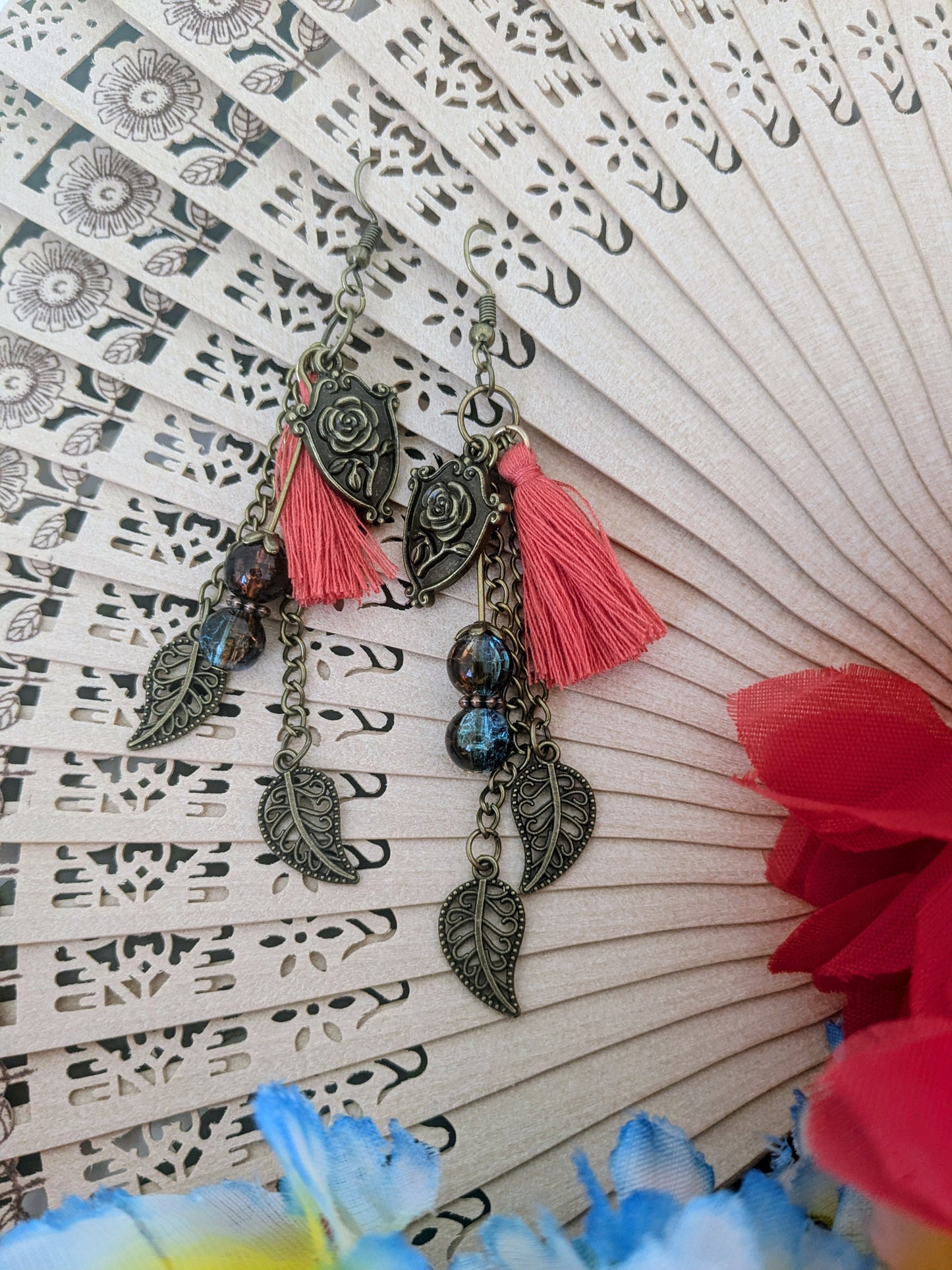 Earring with tassel, beads, charms, and chains