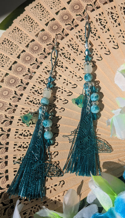 Earring with tassel, beads, and flower