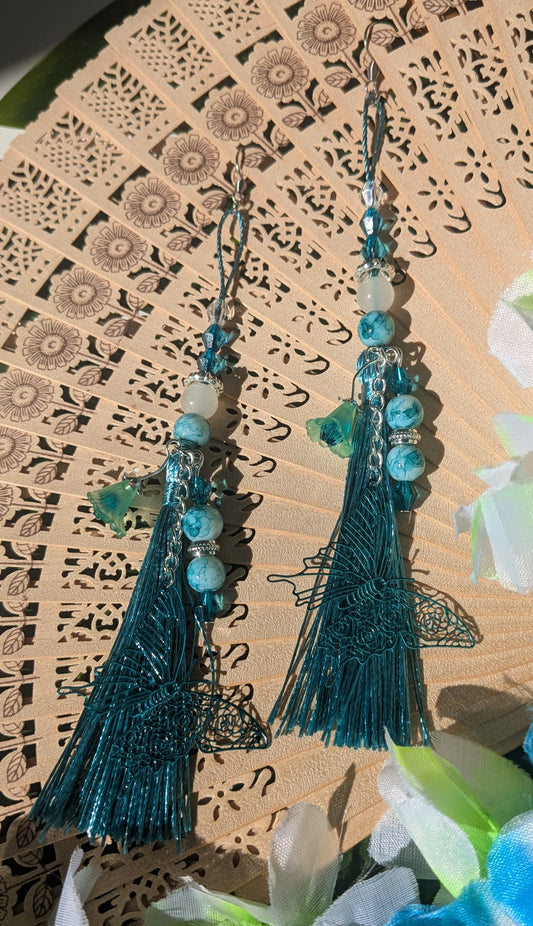 Earring with tassel, beads, and flower