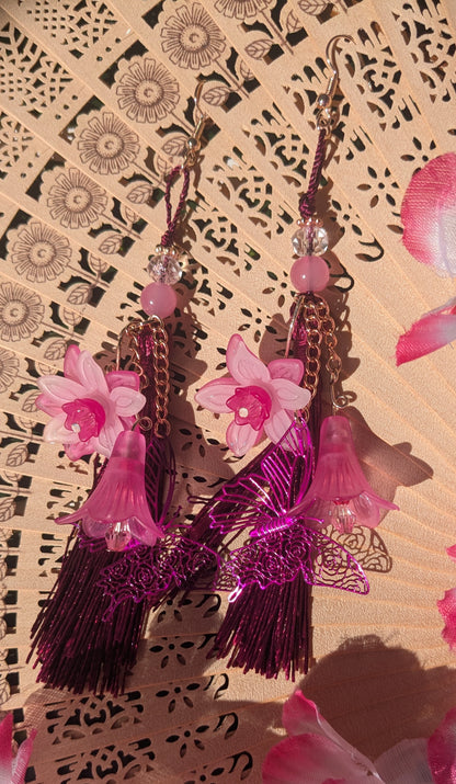Earring with flowers, butterfly, and tassel