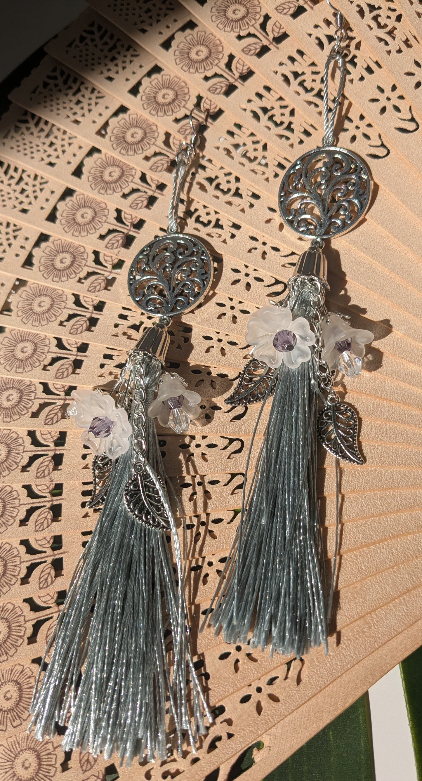 Earring with tassel, flower and pendants