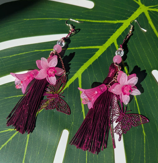 Earring with flowers, butterfly, and tassel