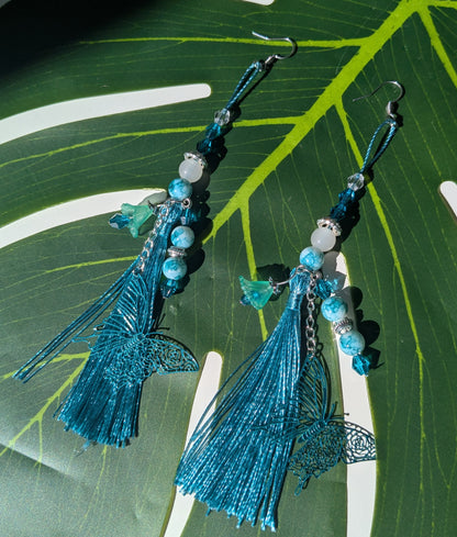 Earring with tassel, beads, and flower