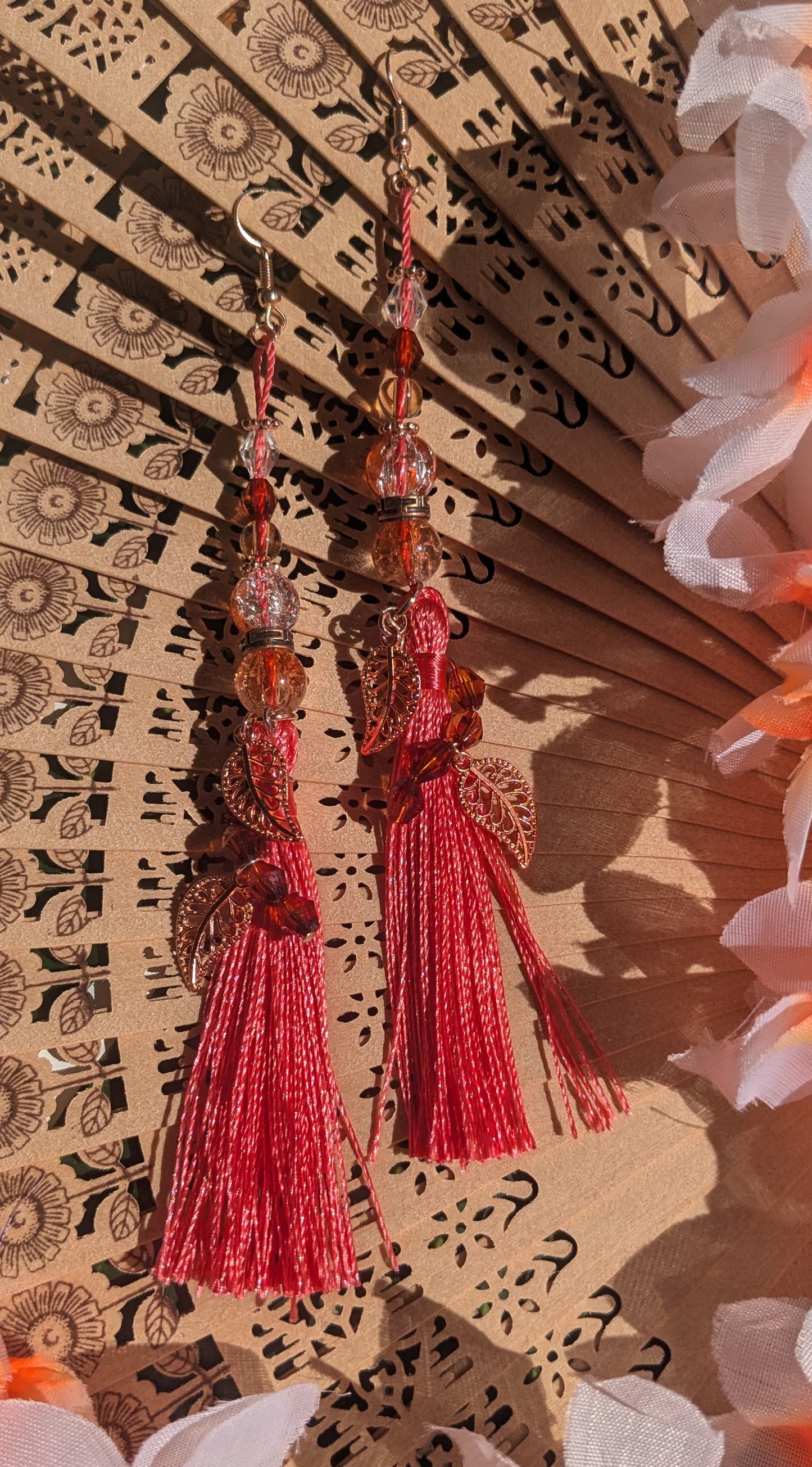 Earring with tassel, beads and charms