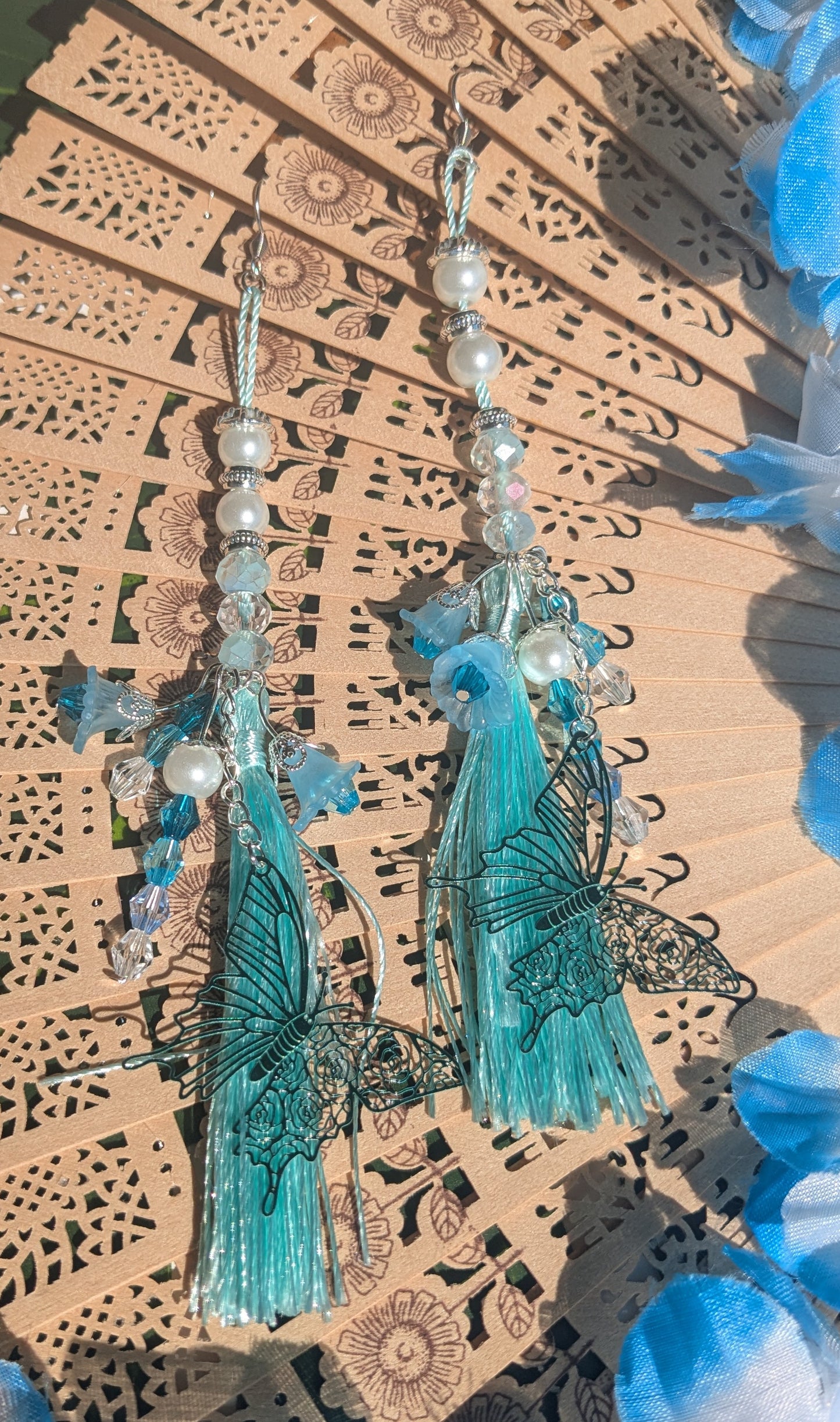 Earring with tassels, flowers, butterfly and beads
