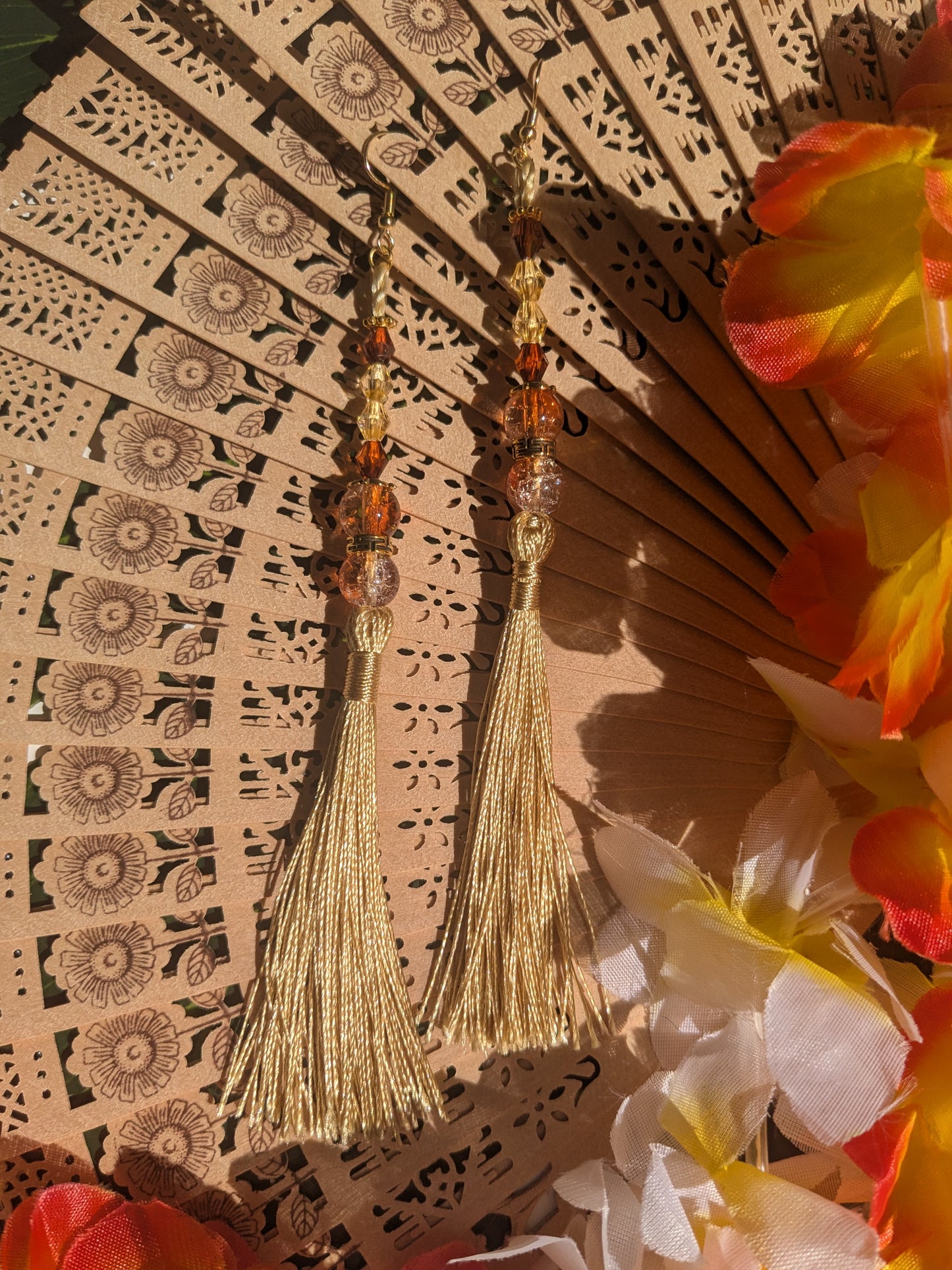 Earring with tassel and beads