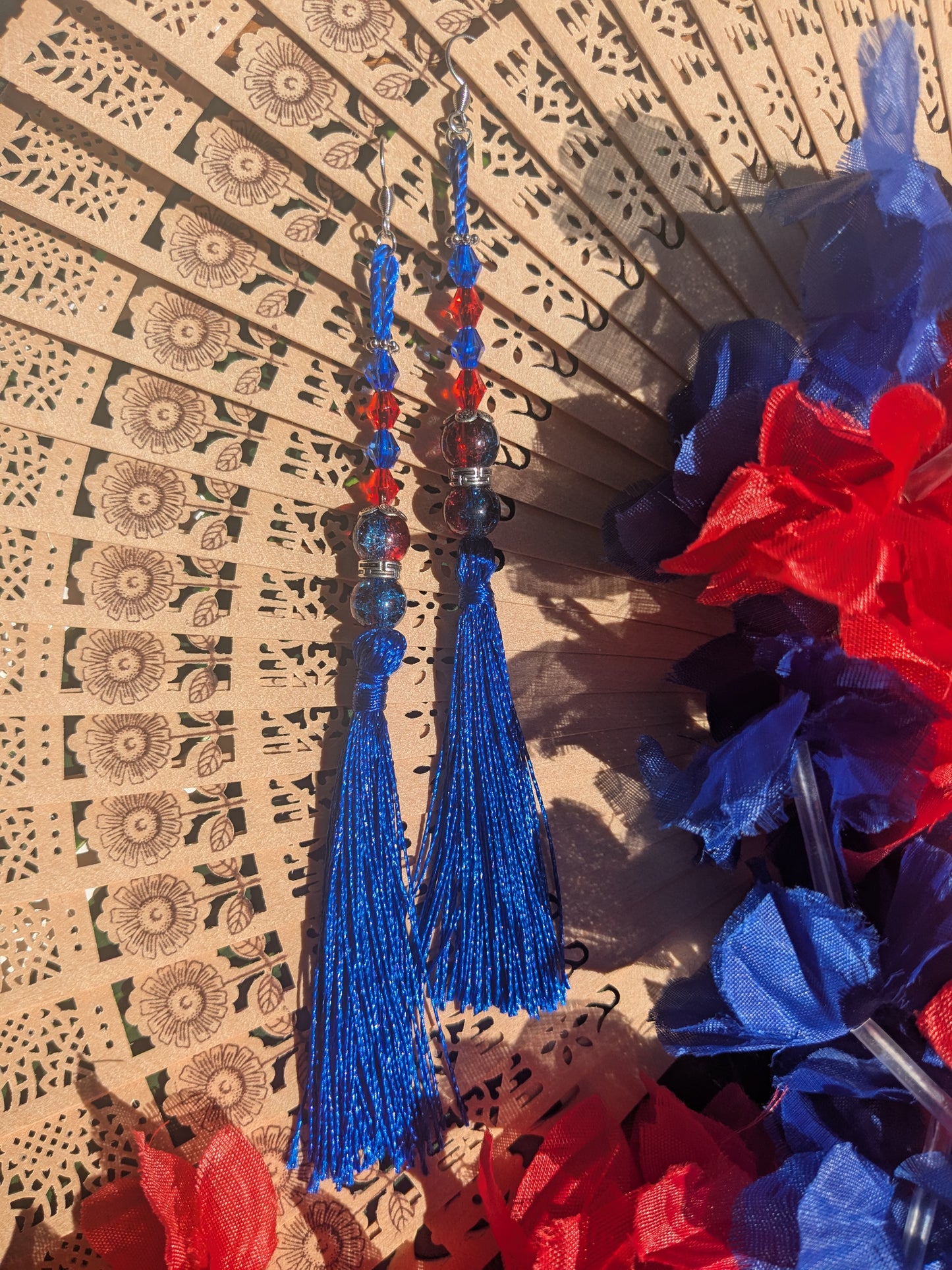 Earring with tassel and beads