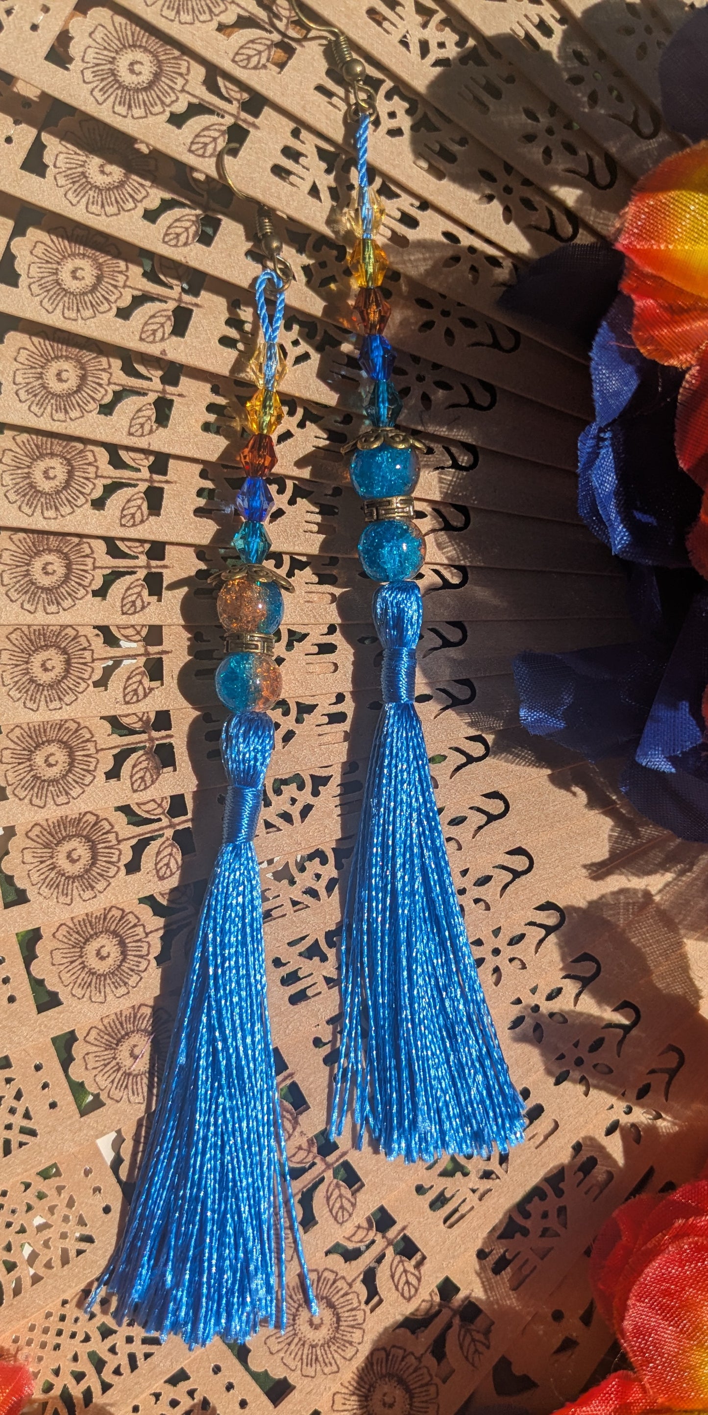 Earring with tassel and beads