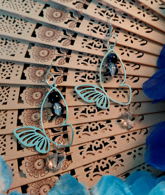 Earring with glass beads and butterfly sharm
