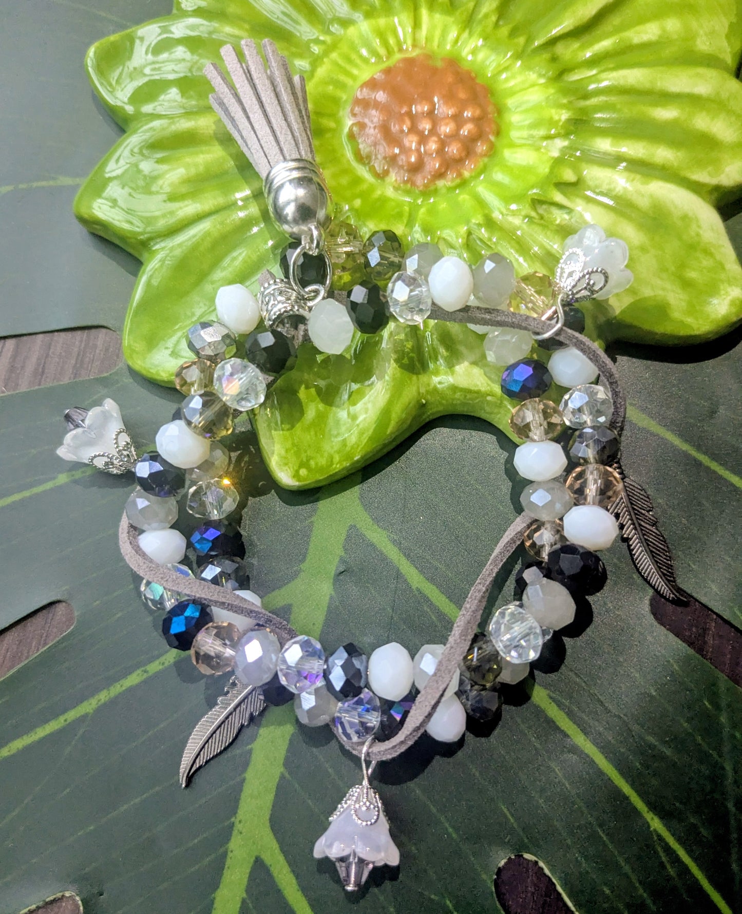 3 layered beaded bracelet with tassel and charms